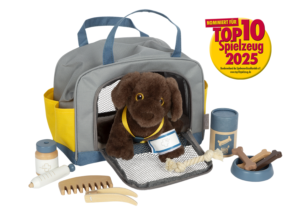 a1 Perro con bolsa de transporte y set de cuidados - Imagen 1